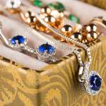 box with jewelery. Rings and pendants. Closeup.